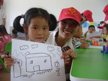 宜州市开展大学生志愿服务万村远程教育暨关爱